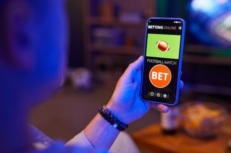 Pengguna menikmati akses Sports Betting batotoo melalui perangkat mobile dengan kualitas tinggi